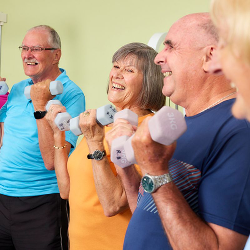 Older adults working out in a gym setting